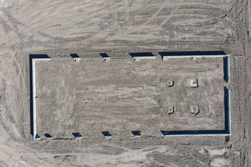 Completed foundation walls at the MSMD Maintenance Building in Meridian, aerial view